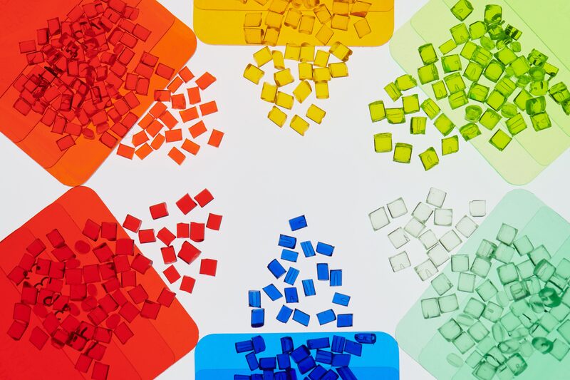 Colored plastic granules